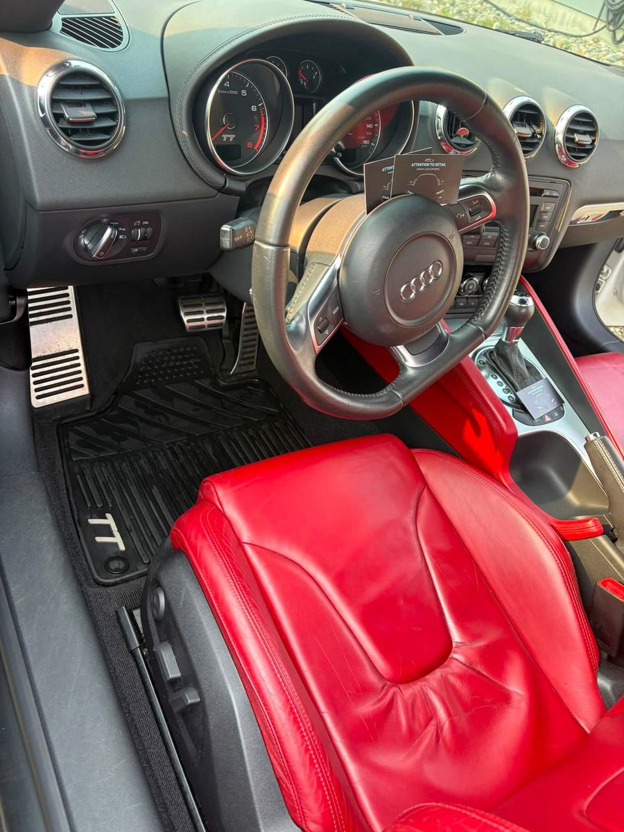 The same Audi TT after detailing — clean dash, vents, wheel and seats