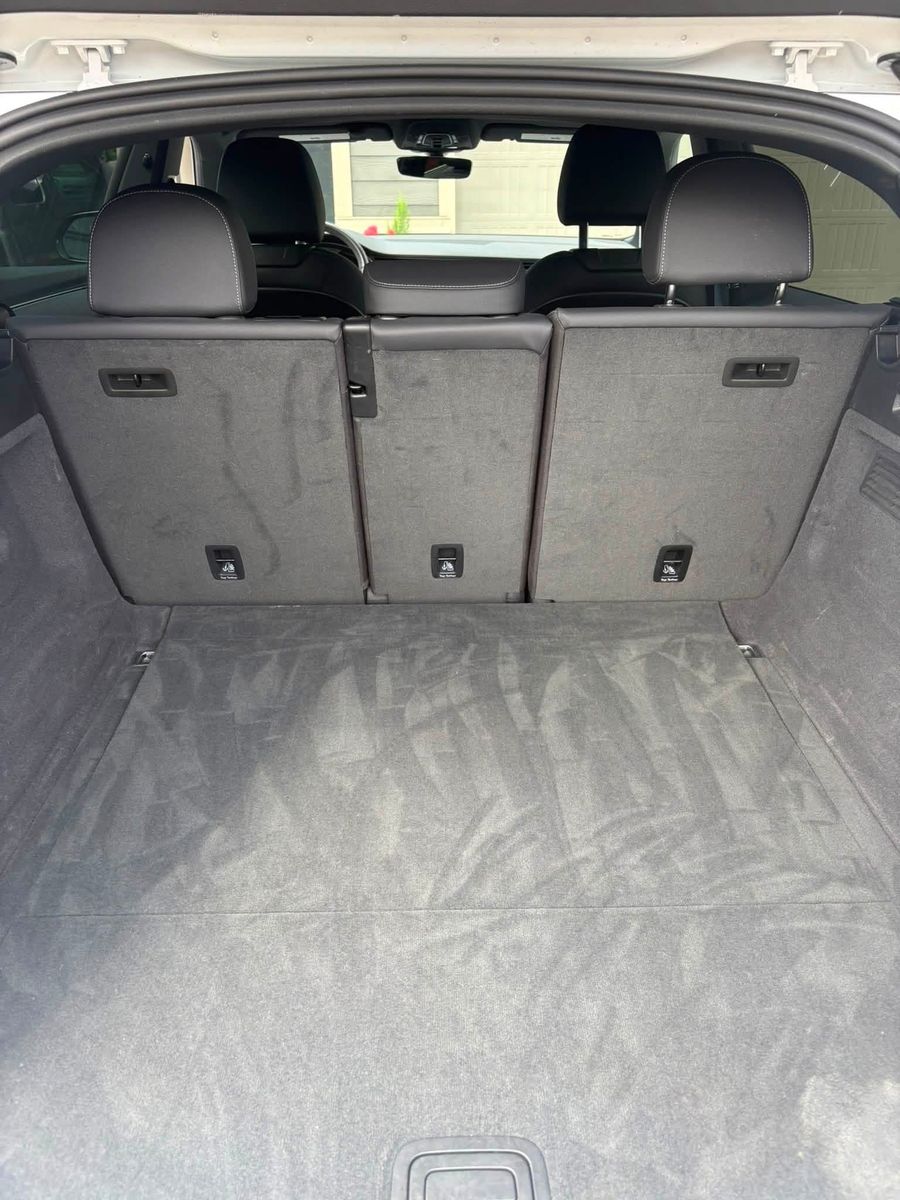 Vacuumed cargo area and rear seat backs of an SUV